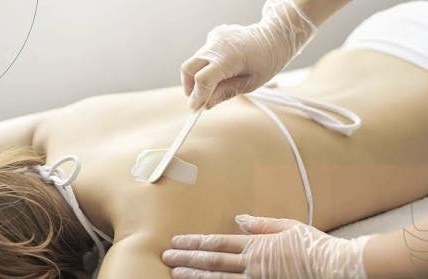 Half Back Wax (Upper/Lower) waxing service at WaxCin Studio in Reno and Sparks